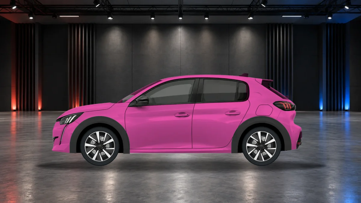 Peugeot e-208 with alloy wheels in the showroom