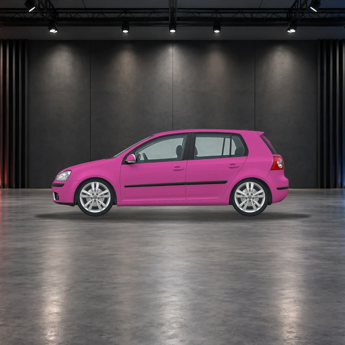 VW Golf with alloy wheels in the showroom