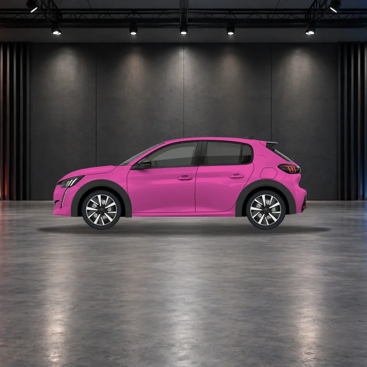 Peugeot e-208 with alloy wheels in the showroom